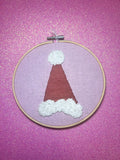 Santa Hat Finished Embroidery Hoop on Pink Fabric